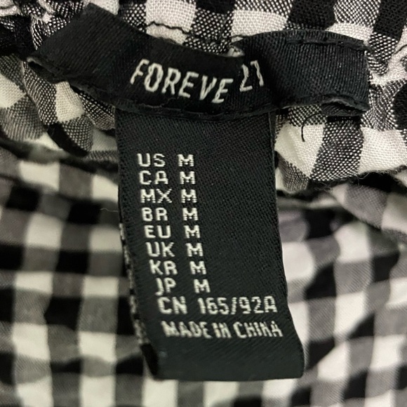 Such a fun crop top! Size M off the shoulder top. Black and white checkered. - Picture 8 of 8